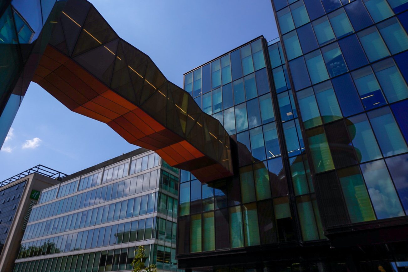 Glass connecting bridge between two buildings