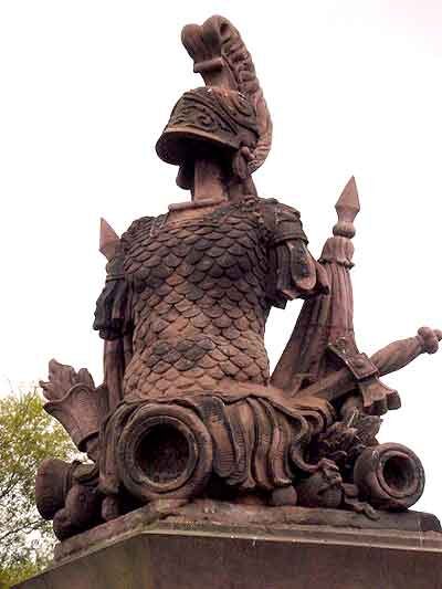 Trophy sculptures with martial equipment made of sandstone