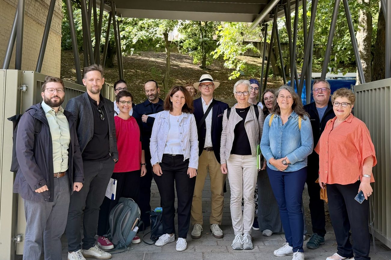 Group with green in the background