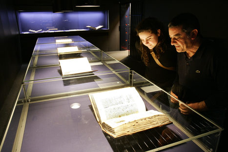Visitors of the museum marvel at the Gutenberg Bible.