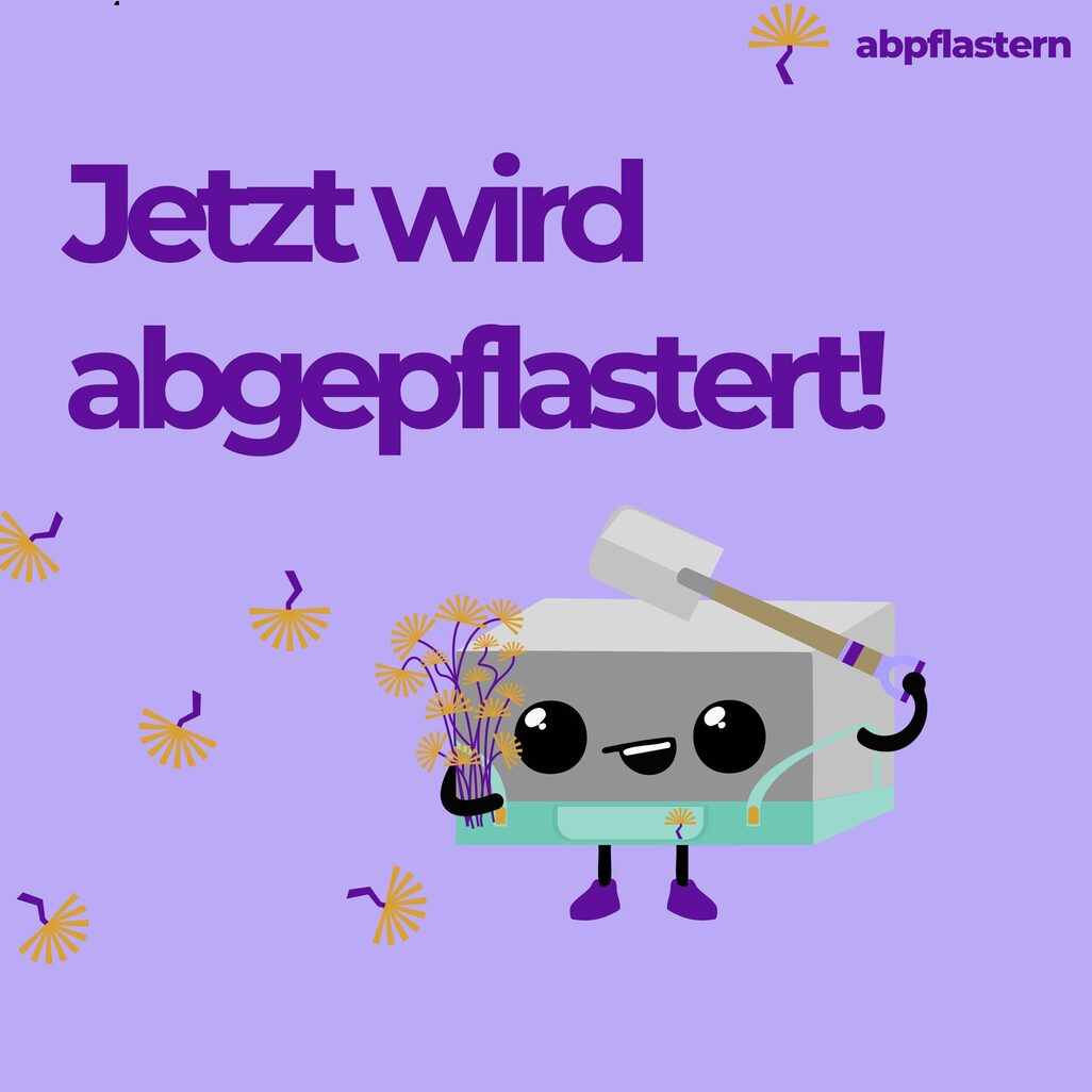 Stein mit Schaufel und Blumen