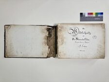 Bildmoitiv Band 2 der handschriftlichen Partitur der Oper Der Wildschütz von A. Lortzing vor der Restaurierung